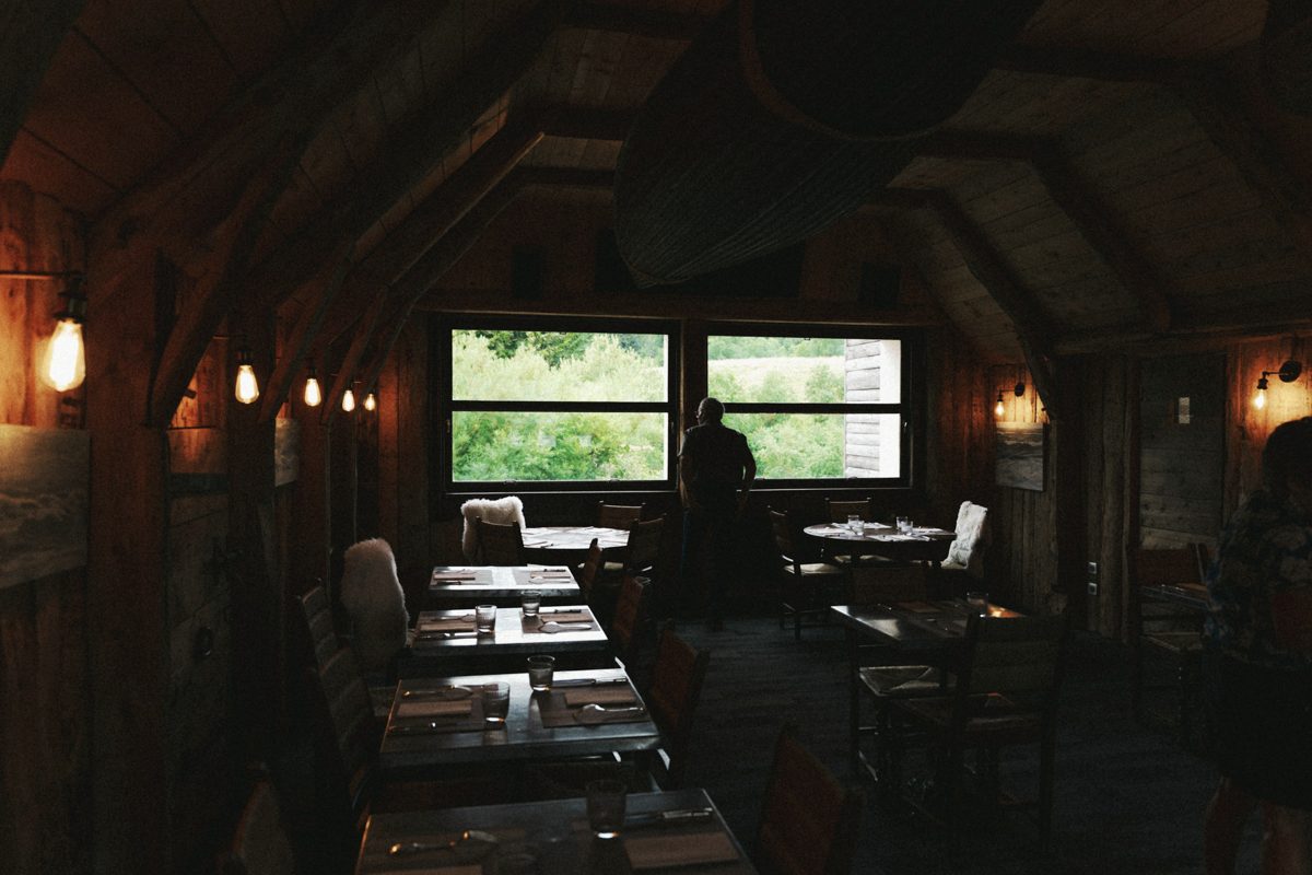 A dining room set, with daylight through the windows