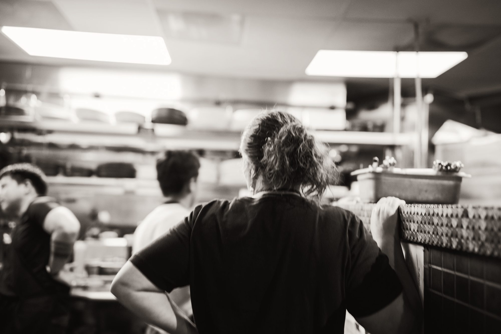 A kitchen crew working through service