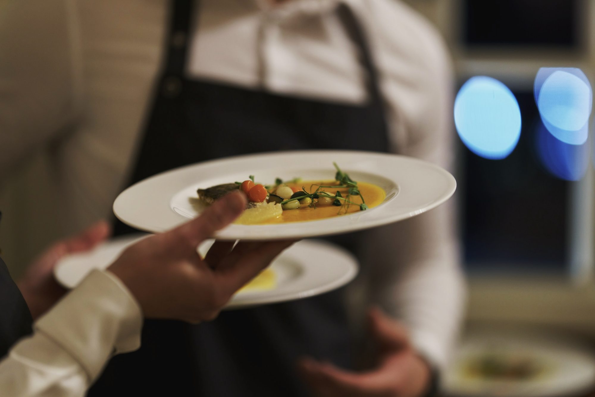 A plate handed across the pass during service